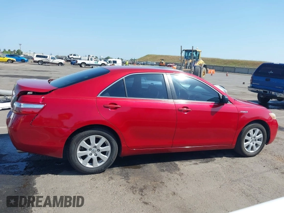 2007 Toyota Camry z VIN JTNBB46K673009891, wystawiony jako IAAI lot #42161828 z przebiegiem 220 292 mil mil oraz . Historia ofert i sprzedaży dostępna na DreamBid. Obrazek 14.