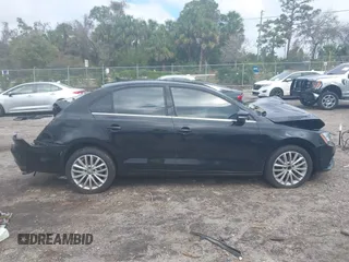 2016 Volkswagen Jetta Sedan 1.8T SEL with VIN 3VWL07AJ9GM258065, listed as a IAAI auction lot 41617182 with 164,891 mi miles. Bid and sale history available at carsss.com. Image 13.