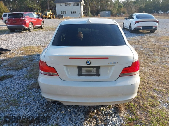 2009 BMW 1 Series 128i with VIN WBAUP93579VF49106, listed as a IAAI auction lot 41443690 with Not provided miles and . Bid and sale history available at DreamBid. Image 16.