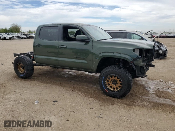 2022 Toyota Tacoma SR with VIN 3TMCZ5AN3NM511541, listed as a Copart auction lot 56299195 with 33,427 mi miles and Salvage title. Bid and sale history available at DreamBid. Image 4.