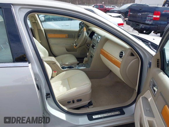 2007 Lincoln MKZ with VIN 3LNHM26T97R631517, listed as a IAAI auction lot 41813657 with 57,725 mi miles and . Bid and sale history available at carsss.com. Image 5.