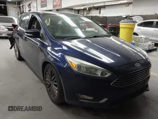 2016 Ford Focus Titanium z VIN 1FADP3N20GL321544, wystawiony jako IAAI lot #42561168 z przebiegiem 115 763 mil mil oraz . Historia ofert i sprzedaży dostępna na DreamBid. Obrazek 1.