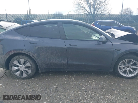2023 Tesla Model Y Long Range with VIN 7SAYGDEE6PF824173, listed as a IAAI auction lot 41728613 with Not Provided miles and . Bid and sale history available at DreamBid. Image 13.