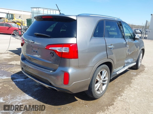 2015 Kia Sorento SX with VIN 5XYKWDA74FG591902, listed as a IAAI auction lot 41856991 with 128,471 mi miles. Bid and sale history available at carsss.com. Image 4.