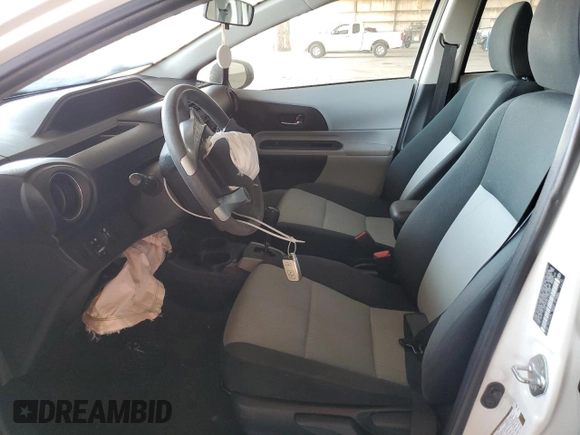 2013 Toyota Prius One z VIN JTDKDTB38D1033589, wystawiony jako Copart lot #55520355 z przebiegiem Nie podano mil oraz Szkoda całkowita • Salvage title. Historia ofert i sprzedaży dostępna na DreamBid. Obrazek 7.