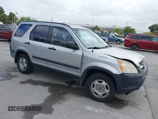 2002 Honda CR-V LX with VIN JHLRD68422C008983, listed as a IAAI auction lot 42112835 with 198,114 mi miles and . Bid and sale history available at carsss.com. Image 1.