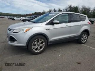 2013 Ford Escape SEL z VIN 1FMCU9H93DUA14753, wystawiony jako Copart lot #65190495 z przebiegiem 147 122 mil mil oraz Czysty tytuł • Clean title. Historia ofert i sprzedaży dostępna na DreamBid. Obrazek 1.