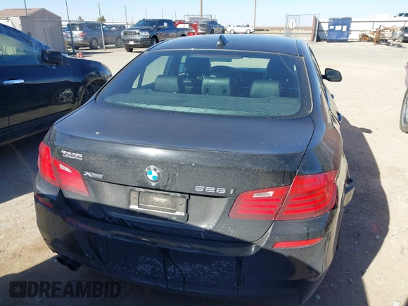 2016 BMW 5 Series 528i xDrive with VIN WBA5A7C56GG145318, listed as a IAAI auction lot 41414556 with 122,879 mi miles. Bid and sale history available at carsss.com. Image 16.