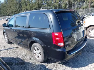 2012 Dodge Grand Caravan SXT with VIN 2C4RDGCG2CR319651, listed as a IAAI auction lot 42097594 with 155,521 mi miles and . Bid and sale history available at DreamBid. Image 3.
