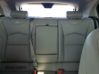 2020 Cadillac XT4 FWD Premium Luxury with VIN 1GYFZCR47LF040062, listed as a Copart auction lot 52309415 with 12,517 mi miles and Salvage title. Bid and sale history available at DreamBid. Image 10.