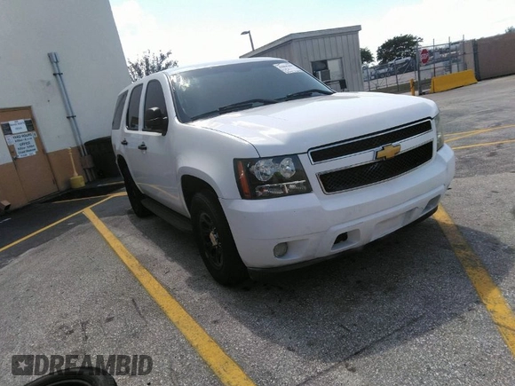2011 Chevrolet Tahoe Commercial with VIN 1GNLC2E02BR325621, listed as a IAAI auction lot 41866389 with 167,693 mi miles and . Bid and sale history available at DreamBid. Image 1.
