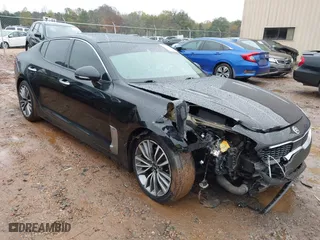 2019 Kia Stinger Premium with VIN KNAE25LAXK6059586, listed as a IAAI auction lot 40913071 with 48,511 mi miles. Bid and sale history available at carsss.com. Image 1.