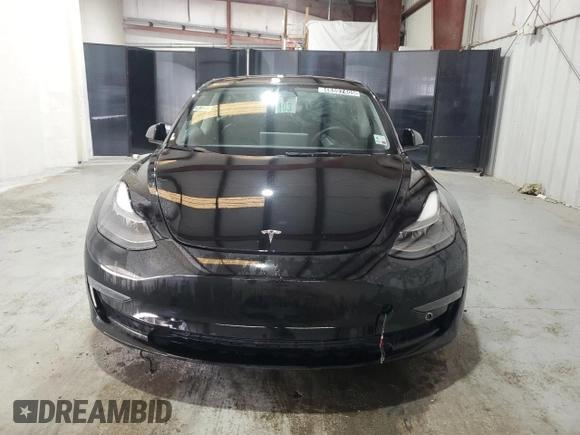 2022 Tesla Model 3 z VIN 5YJ3E1EA1NF286584, wystawiony jako Copart lot #48597405 z przebiegiem 83 340 mil mil oraz Czysty tytuł • Clean title. Historia ofert i sprzedaży dostępna na DreamBid. Obrazek 5.