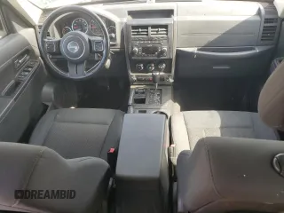 2011 Jeep Liberty Sport with VIN 1J4PN2GK7BW585608, listed as a Copart auction lot 61379875 with 144,904 mi miles and Salvage title. Bid and sale history available at DreamBid. Image 8.