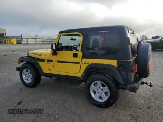 2002 Jeep Wrangler Sport with VIN 1J4FA49S12P708751, listed as a Copart auction lot 79415644 with 219,771 mi miles and Non Repairable. Bid and sale history available at carsss.com. Image 2.