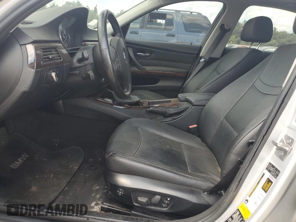 2011 BMW 3 Series 328i xDrive with VIN WBAPK5G57BNN31318, listed as a Copart auction lot 61127785 with Not provided miles and Salvage title. Bid and sale history available at DreamBid. Image 7.