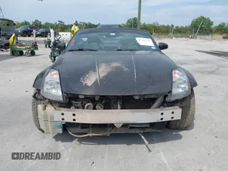 2004 Nissan 350Z Touring z VIN JN1AZ36A14M253275, wystawiony jako IAAI lot #42181345 z przebiegiem 63 886 mil mil oraz . Historia ofert i sprzedaży dostępna na DreamBid. Obrazek 13.