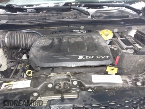 2015 Dodge Grand Caravan SE with VIN 2C4RDGBG2FR592899, listed as a IAAI auction lot 41309499 with 110,428 mi miles and . Bid and sale history available at DreamBid. Image 10.