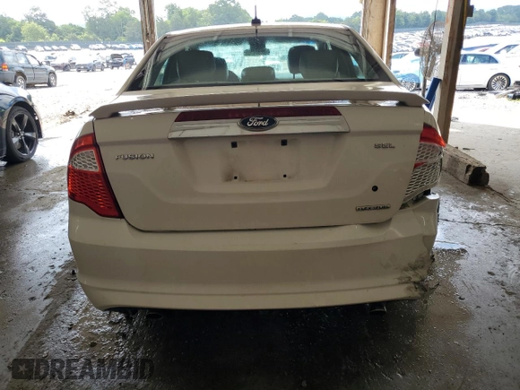 2012 Ford Fusion SEL z VIN 3FAHP0JG9CR164030, wystawiony jako Copart lot #62926985 z przebiegiem 136 043 mil mil oraz Szkoda całkowita • Salvage title. Historia ofert i sprzedaży dostępna na DreamBid. Obrazek 6.