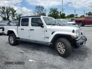 2023 Jeep Gladiator Freedom z VIN 1C6HJTAG6PL535119, wystawiony jako Copart lot #56870905 z przebiegiem 23 707 mil mil oraz Szkoda całkowita • Salvage title. Historia ofert i sprzedaży dostępna na DreamBid. Obrazek 4.
