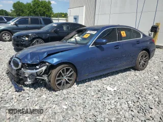 2021 BMW 3 Series 330i with VIN 3MW5R1J06M8B56990, listed as a Copart auction lot 50952045 with 0 mi miles and Clean Title. Bid and sale history available at carsss.com. Image 1.