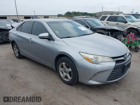 2015 Toyota Camry XLE with VIN 4T4BF1FKXFR472201, listed as a IAAI auction lot 41883944 with 143,296 mi miles and . Bid and sale history available at DreamBid. Image 1.