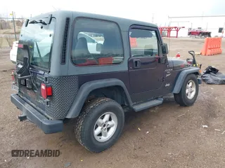 1999 Jeep Wrangler Sport with VIN 1J4FY19S9XP419330, listed as a IAAI auction lot 41913314 with 167,176 mi miles. Bid and sale history available at carsss.com. Image 4.
