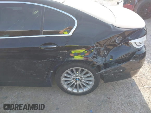2011 BMW 5 Series 535i xDrive with VIN WBAFU7C53BC872492, listed as a IAAI auction lot 42011055 with 53,647 mi miles and . Bid and sale history available at DreamBid. Image 12.