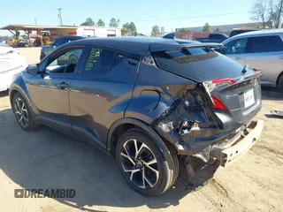 2018 Toyota C-HR XLE with VIN NMTKHMBXXJR021230, listed as a IAAI auction lot 41684693 with 157,438 mi miles and . Bid and sale history available at DreamBid. Image 3.