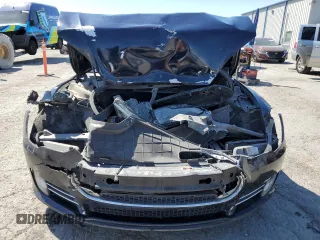 2014 Tesla Model S 60 with VIN 5YJSA1H13EFP38425, listed as a Copart auction lot 54156245 with 183,968 mi miles and Salvage title. Bid and sale history available at DreamBid. Image 5.
