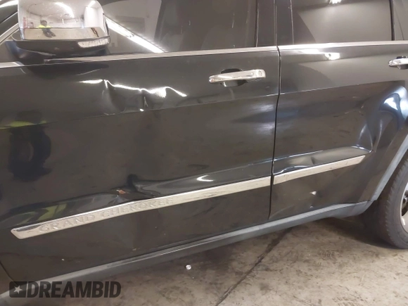 2012 Jeep Grand Cherokee Limited with VIN 1C4RJEBG4CC129194, listed as a IAAI auction lot 41168750 with 184,077 mi miles. Bid and sale history available at carsss.com. Image 6.