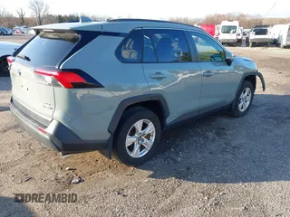 2019 Toyota RAV4 Hybrid XLE with VIN JTMRWRFV0KD013274, listed as a IAAI auction lot 41918992 with 97,850 mi miles. Bid and sale history available at carsss.com. Image 4.