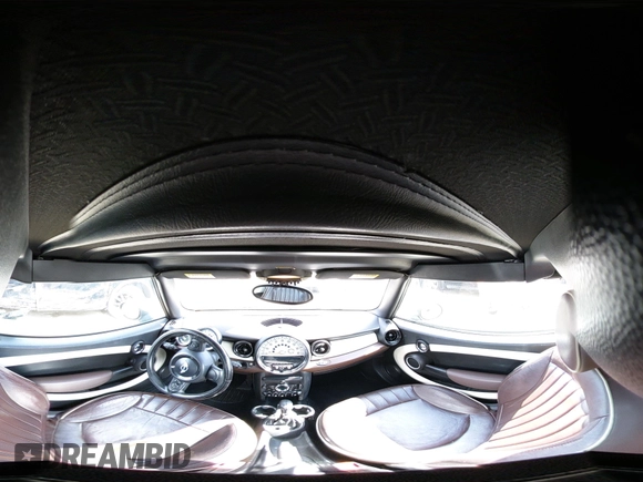 2012 MINI Convertible z VIN WMWZN3C53CT134194, wystawiony jako IAAI lot #42261686 z przebiegiem 104 099 mil mil oraz . Historia ofert i sprzedaży dostępna na DreamBid. Obrazek 18.