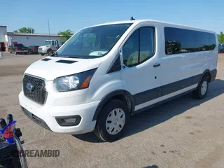 2023 Ford Transit Passenger XL with VIN 1FBAX2YG3PKA90941, listed as a IAAI auction lot 42472270 with 43,141 mi miles and . Bid and sale history available at DreamBid. Image 2.
