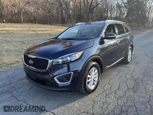 2016 Kia Sorento LX with VIN 5XYPGDA5XGG142632, listed as a Copart auction lot 54625695 with 146,966 mi miles and Clean Title. Bid and sale history available at carsss.com. Image 2.