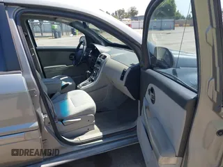 2005 Chevrolet Equinox LT z VIN 2CNDL63FX56042892, wystawiony jako IAAI lot #42420296 z przebiegiem 129 460 mil mil oraz . Historia ofert i sprzedaży dostępna na DreamBid. Obrazek 5.