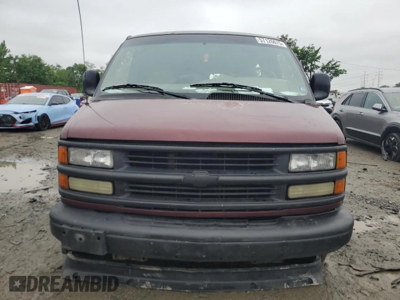 2001 Chevrolet Express z VIN 1GAHG39R511219607, wystawiony jako Copart lot #57126675 z przebiegiem 228 975 mil mil oraz Szkoda całkowita • Salvage title. Historia ofert i sprzedaży dostępna na DreamBid. Obrazek 5.