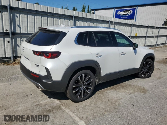 2024 Mazda CX-50 Premium z VIN 7MMVABDY9RN194560, wystawiony jako Copart lot #73734794 z przebiegiem 3 585 mil mil oraz Szkoda całkowita • Salvage title. Historia ofert i sprzedaży dostępna na DreamBid. Obrazek 3.