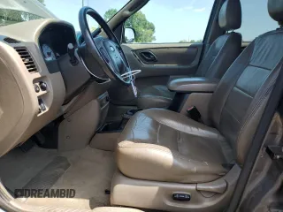 2002 Ford Escape XLT Choice with VIN 1FMYU04132KD84336, listed as a Copart auction lot 66705025 with 198,979 mi miles and Salvage title. Bid and sale history available at DreamBid. Image 7.