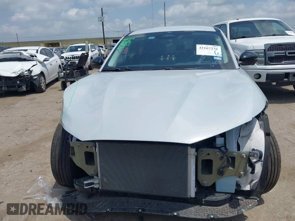 2023 Ford Mustang Mach-E Select z VIN 3FMTK1R40PMA76405, wystawiony jako IAAI lot #42167231 z przebiegiem 16 927 mil mil oraz . Historia ofert i sprzedaży dostępna na DreamBid. Obrazek 11.