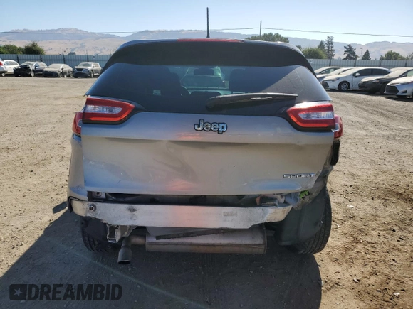 2015 Jeep Cherokee Sport with VIN 1C4PJLAB7FW762115, listed as a Copart auction lot 61613335 with 150,650 mi miles and Salvage title. Bid and sale history available at DreamBid. Image 6.