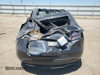 2024 Tesla Model Y z VIN 7SAYGDED6RF204899, wystawiony jako Copart lot #65517855 z przebiegiem Nie podano mil oraz Czysty tytuł • Clean title. Historia ofert i sprzedaży dostępna na DreamBid. Obrazek 6.