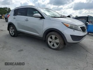 2011 Kia Sportage LX z VIN KNDPB3A24B7050422, wystawiony jako Copart lot #58639255 z przebiegiem 179 160 mil mil oraz Czysty tytuł • Clean title. Historia ofert i sprzedaży dostępna na DreamBid. Obrazek 4.