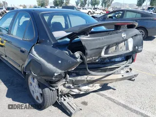 2005 Nissan Sentra S z VIN 3N1CB51D15L559284, wystawiony jako IAAI lot #42273159 z przebiegiem 217 646 mil mil oraz . Historia ofert i sprzedaży dostępna na DreamBid. Obrazek 6.