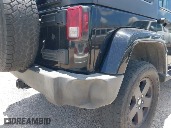 2007 Jeep Wrangler Unlimited Sahara with VIN 1J4GA59187L187656, listed as a IAAI auction lot 42554114 with 200,840 mi miles and . Bid and sale history available at DreamBid. Image 6.