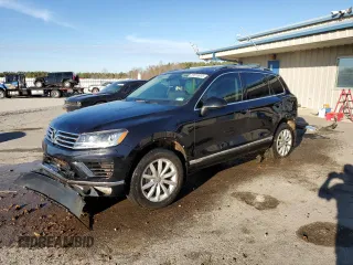 2016 Volkswagen Touareg Sport с VIN WVGEP9BP3GD004865, выставлен на аукционе Copart как лот 87610915 с пробегом Не указан миль и Списание • Salvage title. История ставок и продаж доступна на DreamBid. Изображение 1.