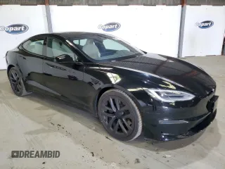 2021 Tesla Model S Plaid with VIN 5YJSA1E68MF432125, listed as a Copart auction lot 60843515 with 5,581 mi miles and Salvage title. Bid and sale history available at DreamBid. Image 4.