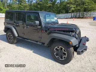 2016 Jeep Wrangler Unlimited Rubicon Hard Rock z VIN 1C4BJWFG6GL125252, wystawiony jako Copart lot #55241115 z przebiegiem 193 554 mil mil oraz Szkoda całkowita • Salvage title. Historia ofert i sprzedaży dostępna na DreamBid. Obrazek 4.