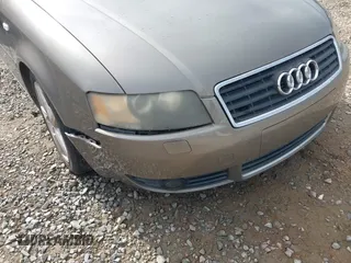 2003 Audi A4 1.8T with VIN WAUAC48H13K028750, listed as a IAAI auction lot 41539326 with 215,152 mi miles. Bid and sale history available at carsss.com. Image 6.