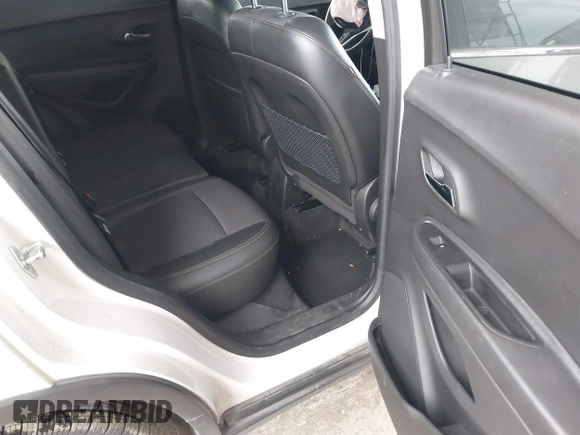 2020 Chevrolet Trax LT with VIN KL7CJLSBXLB010793, listed as a IAAI auction lot 41704879 with 124,915 mi miles and . Bid and sale history available at DreamBid. Image 8.